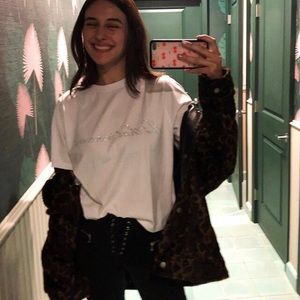 “Not that innocent” rhinestone tee